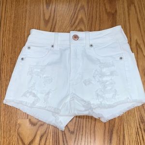 distressed/ripped white denim shorts